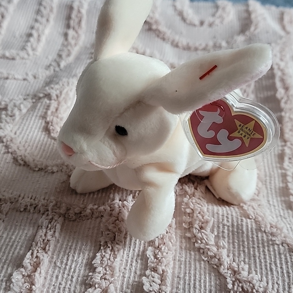 Ty Beanie Baby, Nibbler. Perfect condition, like new. Tag and tag protector.
